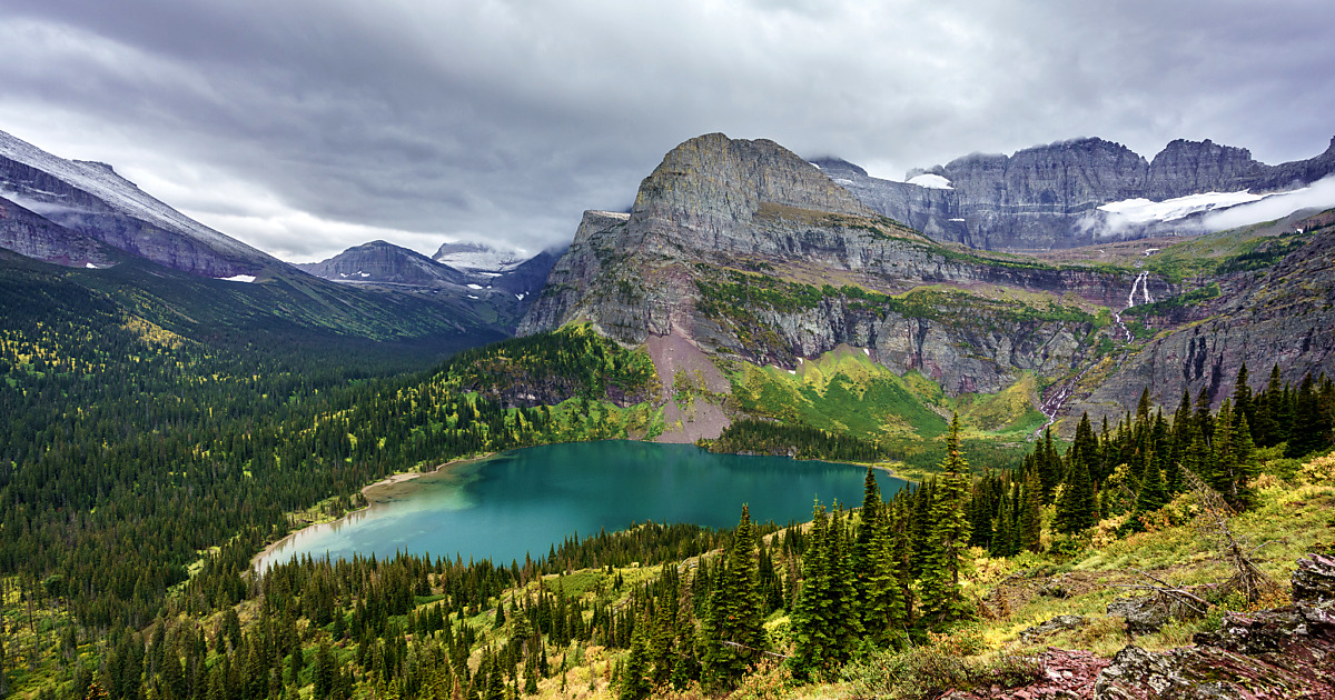 Grinnell Lake and Falls in Glacier National Park under Rain Clouds ...